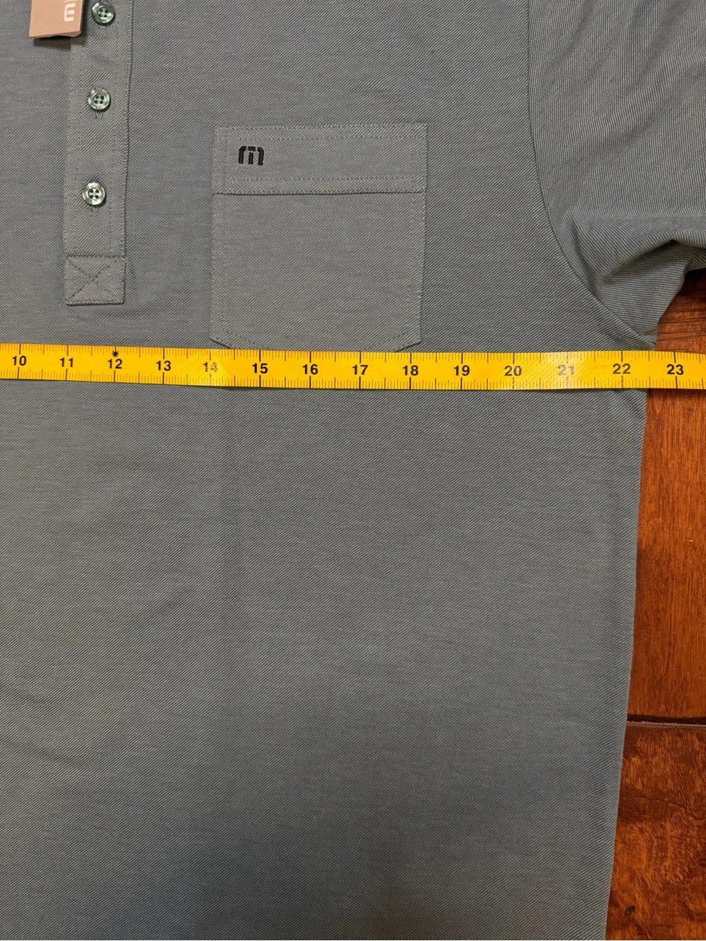 Travis Mathew polo features